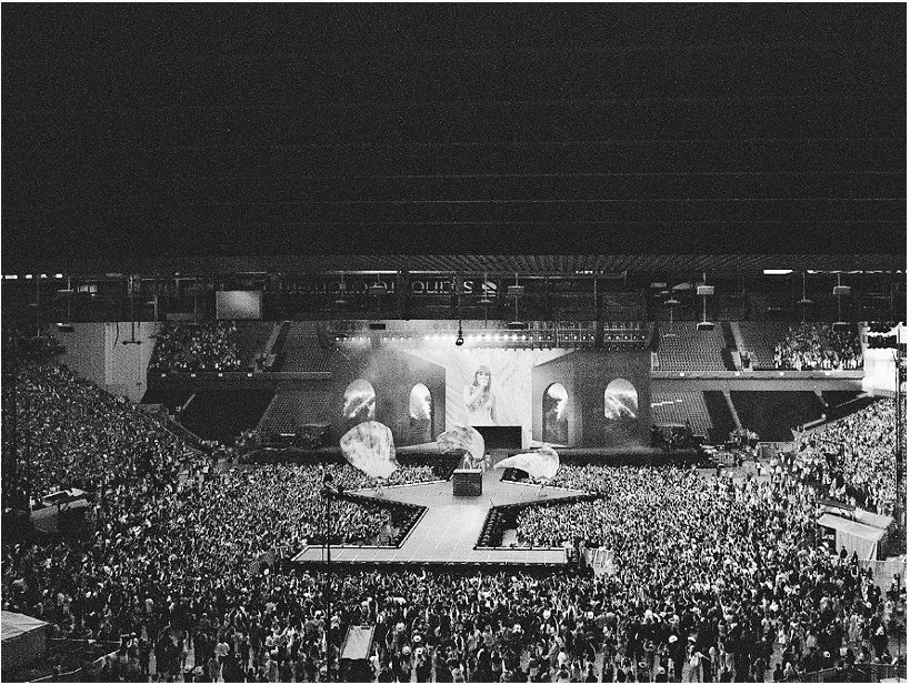 Black and white crowd shot of a concert