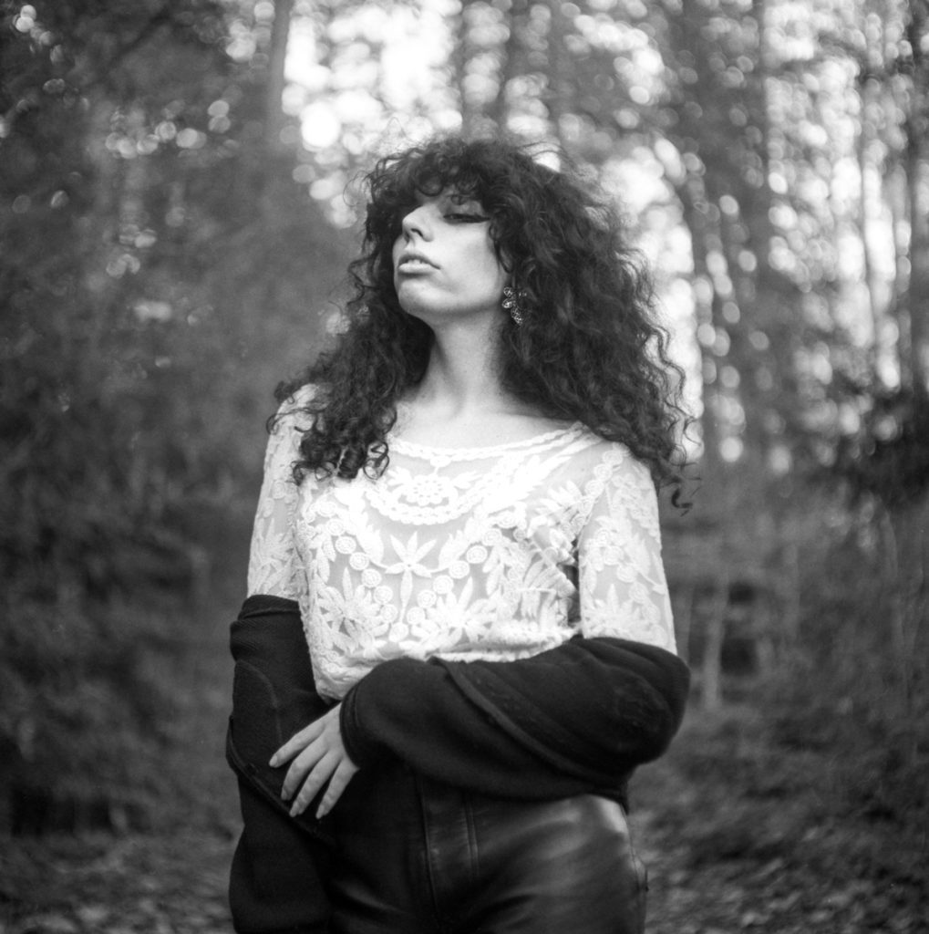Trans woman posing in the woods