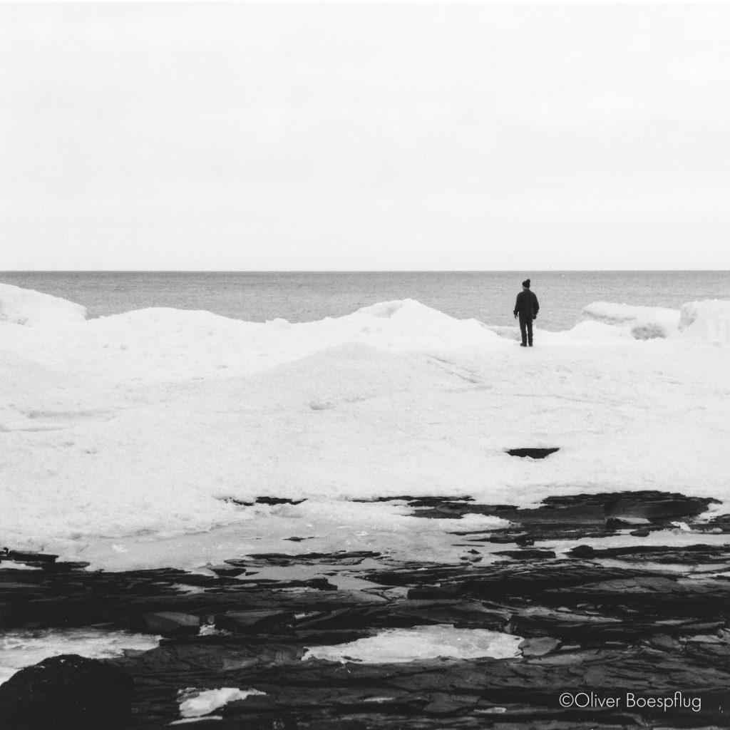 Black and white picture of snow on the beach