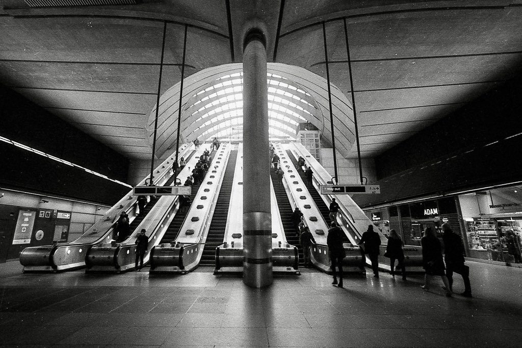 Black and white picture of escalators