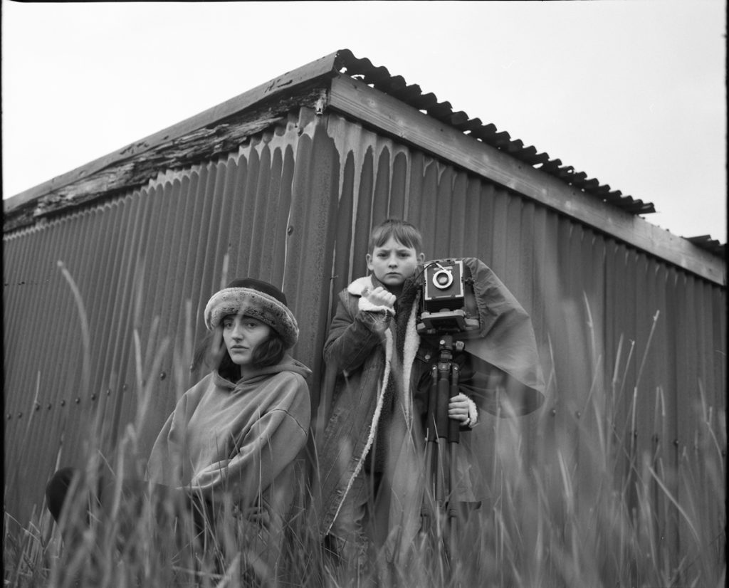 Black and white picture of a woman and a boy