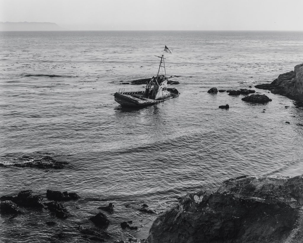 Black and white picture of a boat in the sea