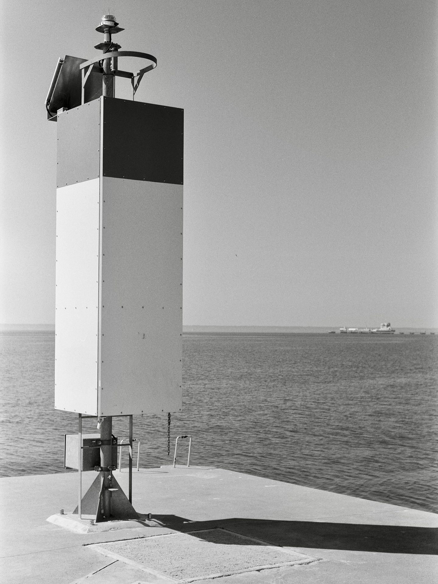 leicalove196607/18/25 The Bronte Pier - Shell Pier and the Niagara Escarpment in the background. Bronte Harbour is a wonderful place for a walk . . . and a coffee at my favourite coffee shop—Taste of Columbia. #tasteofcolumbia #visitoakville #brontepier #ilfordpanf50 #ilfordphoto #leica_camera #summicron50 #bwfilmphotography #fridayfavourites