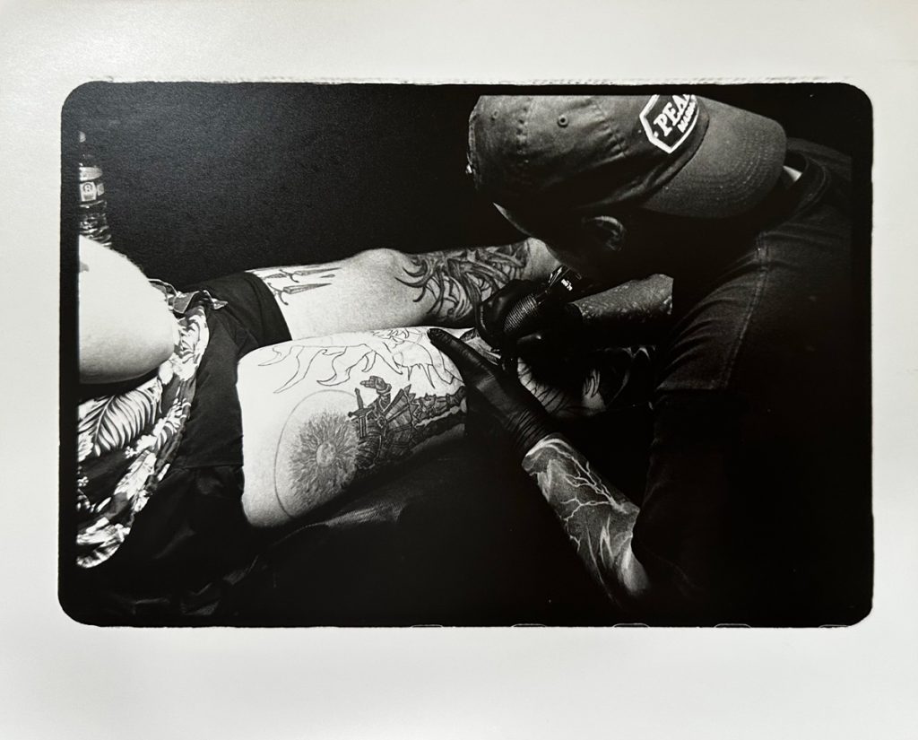 someone getting tattooed