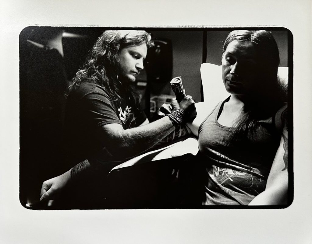 someone getting tattooed