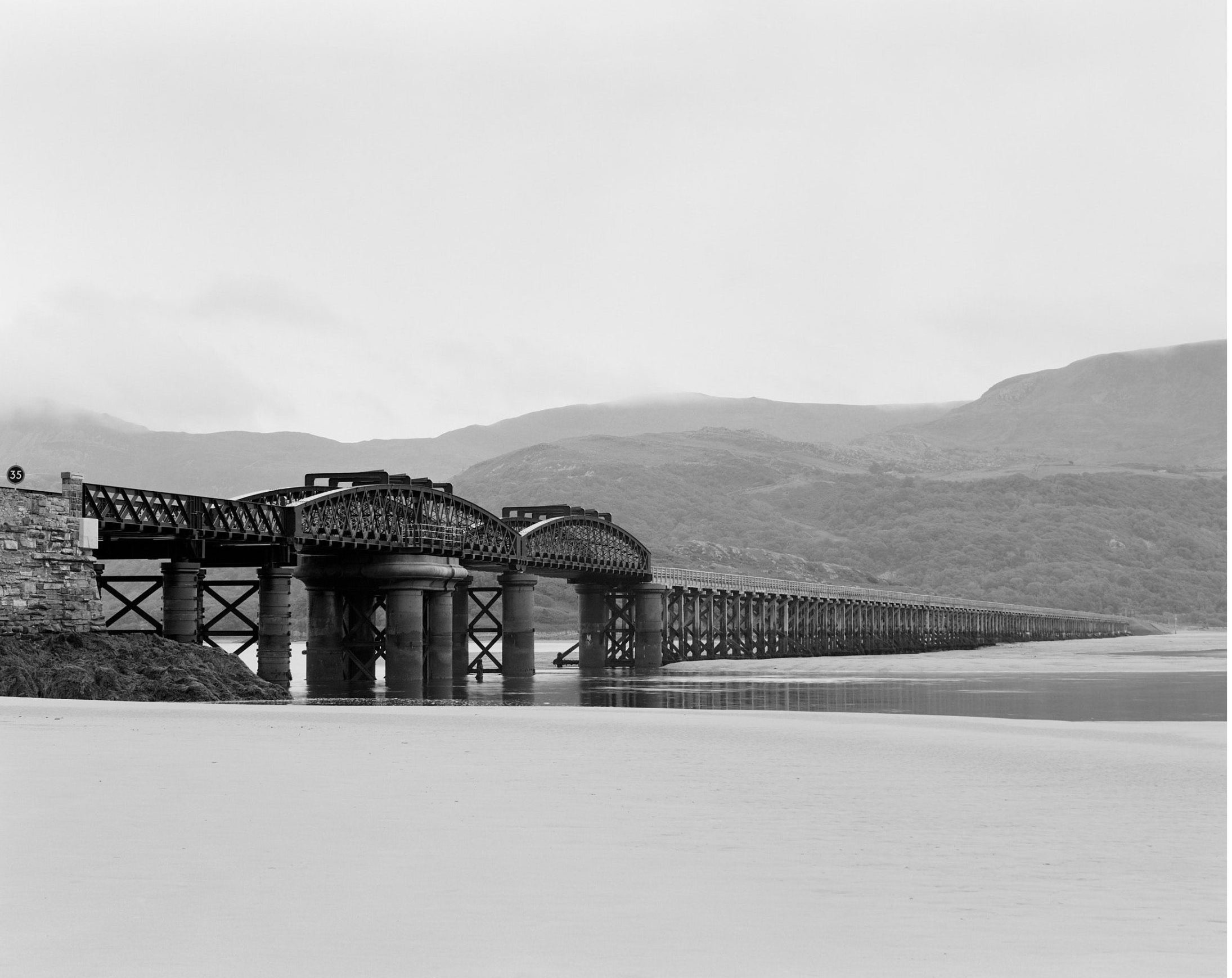 @iandaisley Barmouth Bridge, 2025. Mum had a caravan just up the coast at Tal-y-Bont and we’d visit every year. Fond memories. Ilford PANF, RB67 Pro SD, 127mm F/3.5 L lens: f/27, 1 s. Developed with Ilfotec HC. #fridayfavourites #ilfordphoto #mamyiarb67 #barmouthbridge