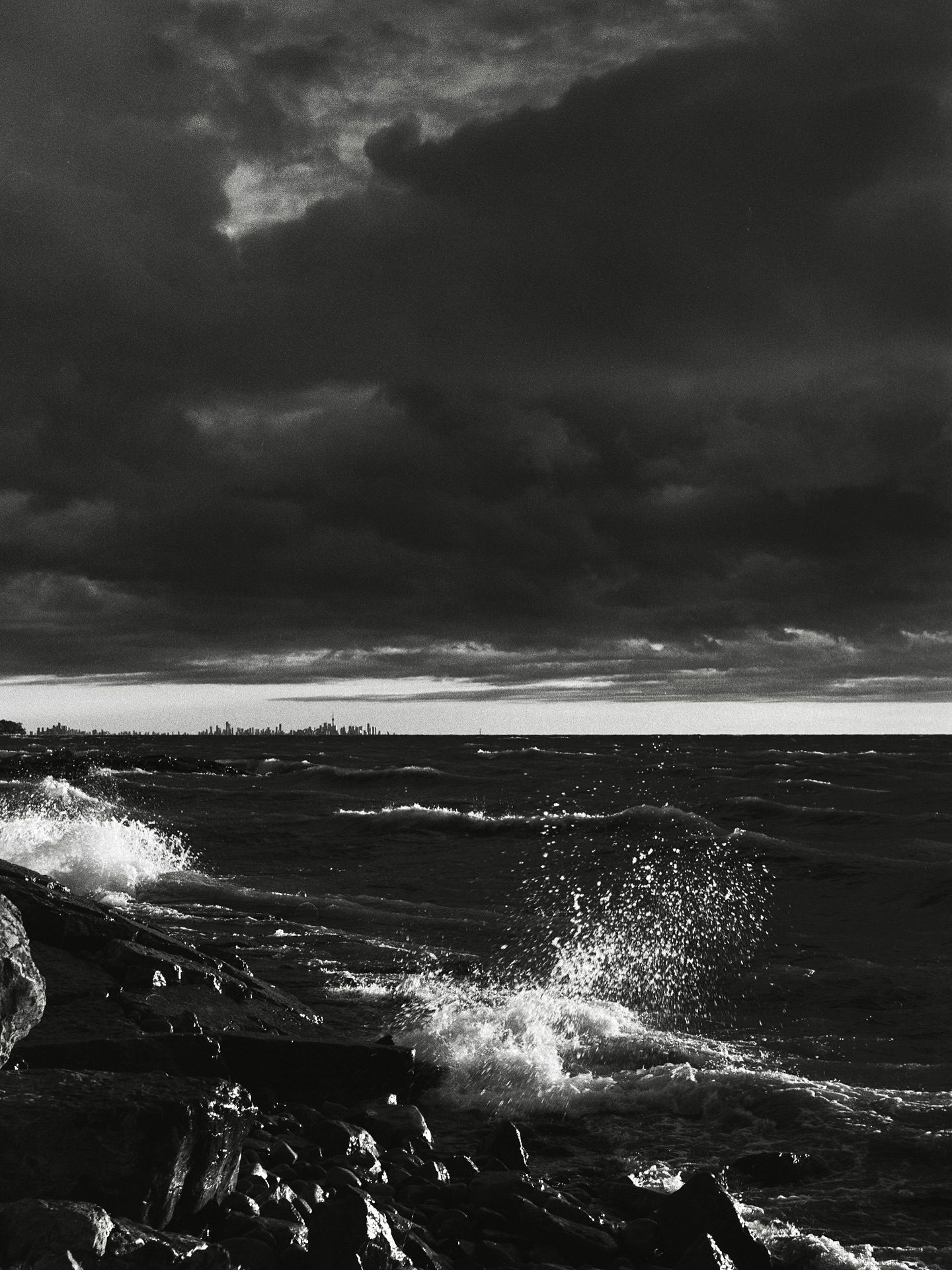 leicalove19666d Toronto City Skyline, Lake Ontario. Autumn 2025. Best viewed, and available as a full-sized print. 12”x18”. Film: IlfordPanF Camera: 1966 Leica M4, Summilux 50 #cityskyline #torontocityskyline #torontosky #autumnal #ilfordphoto #ilfordpanf50 #fridayfavourites #fallfilm #leica_camera #summilux50 #lakeontario #torontofilmphotographers