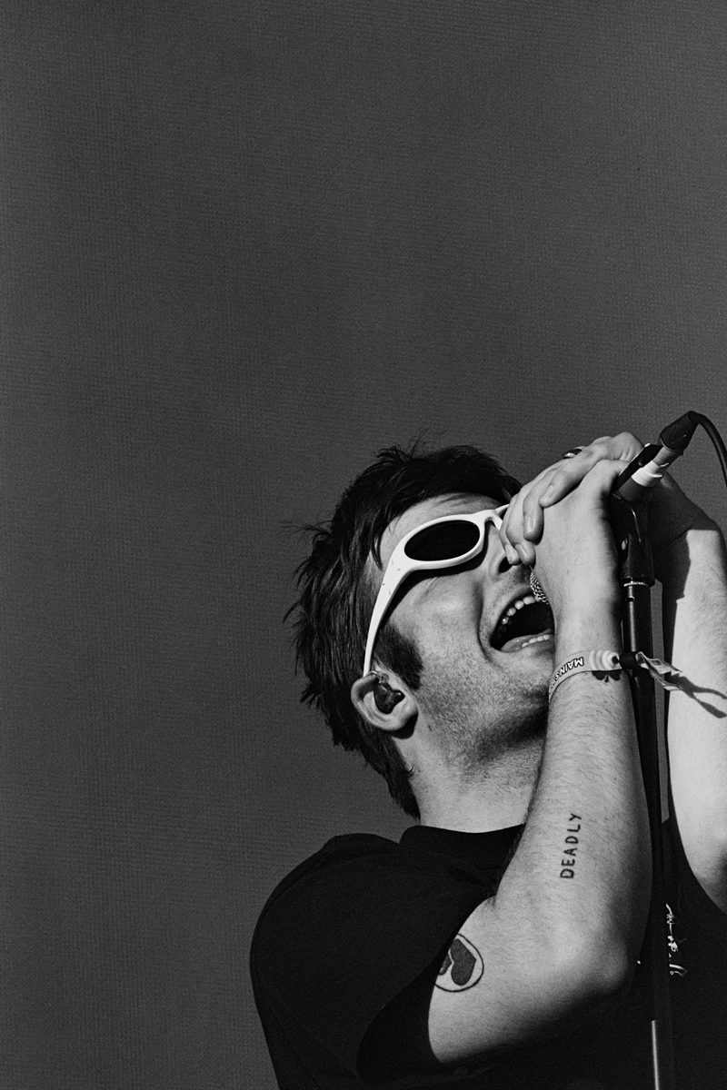 Fotaines shot by Elliot Hetherton at TRNSMNT festival on ILFORD XP2S black and white film