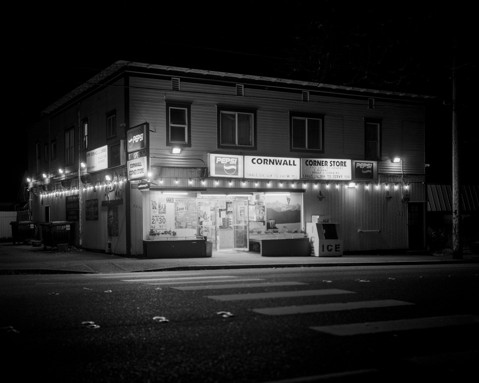 @kellachrome.bsky.social‬· 6d
Cornwall Corner Store, Bellingham, WA

📷 Crown Graphic
🎞️ Ilford HP5+ 4x5 Sheet Film

#fridayfavourites #shotinthedark 
@ilfordphoto.com
 #BelieveInFilm