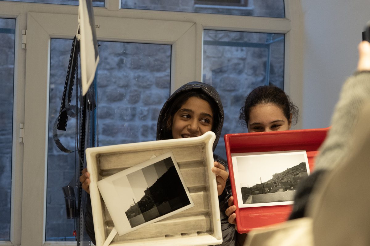 Students learning at Fotohane Darkroom