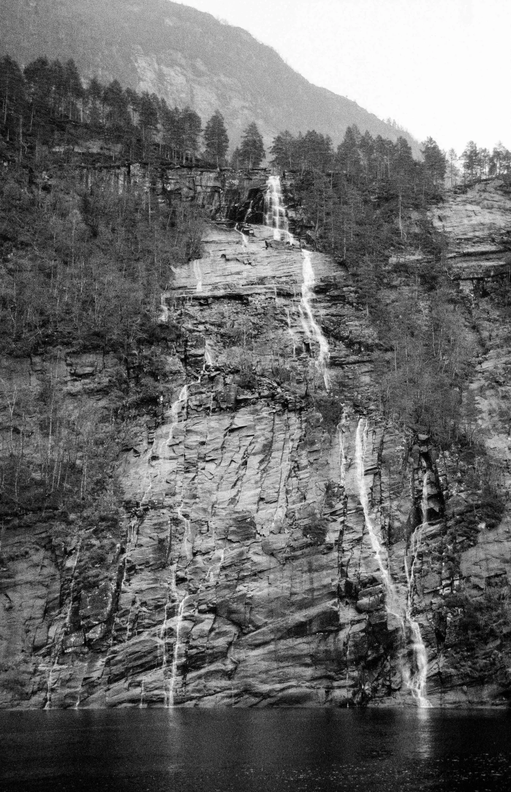  ‪@rosiestquartz.eurosky.social‬· 19h Fluid Motion (part II), Bergsåafossen, Norway 🇳🇴 📸Canon EOS 300 w/ EF 35-105mm 🎞️ @ilfordphoto.com FP4+ @ 500 #believeinfilm #filmphotography #fridayfavourites #norge #norway
